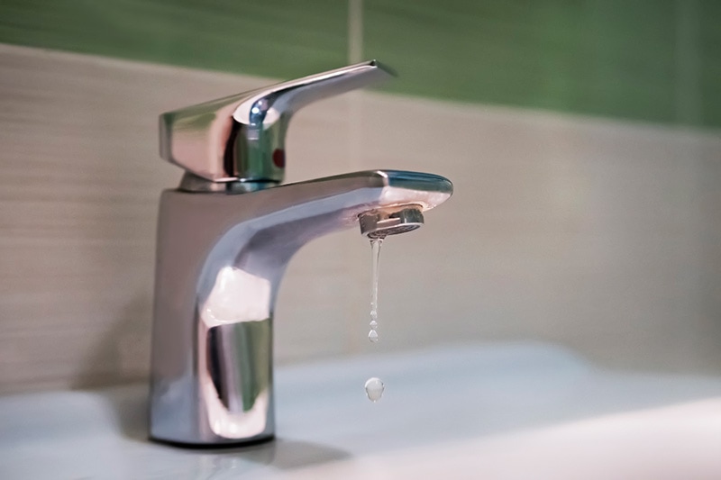 5 Plumbing Problems Costing You Money - Drippy Faucet.